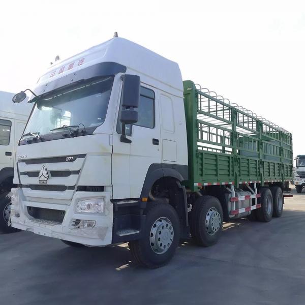 China 60 Tons LHD Manual 8×4 Sinotruk Howo Cargo Truck supplier