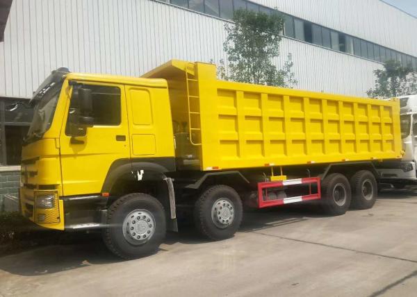 China HOWO 8×4 Heavy Duty Dump Truck , LHD Sinotruk Tipper Truck Yellow Color supplier