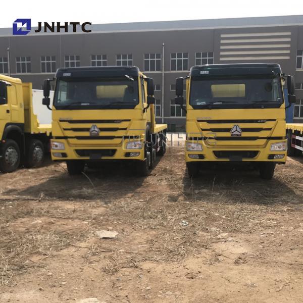 China SINOTRUK Howo Heavy Cargo Truck 35 Tones Flatbed Trailer Tri Axle Flatbed supplier