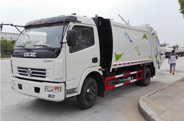 China Dongfeng 4*2 Garbage Compactor Truck 120Hp Self Loading and Discharge Garbage Truck supplier