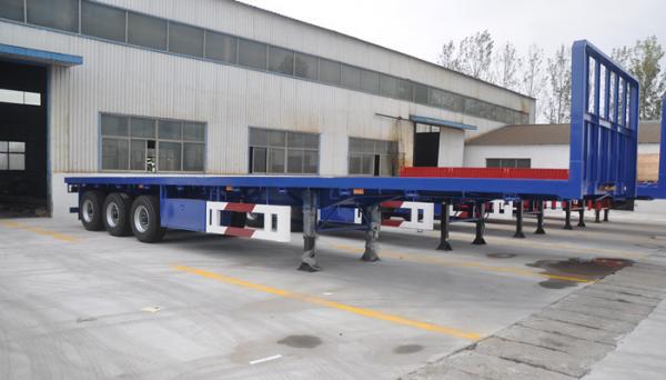 China 3 Axles 50 Tons ABS Braking System Low Flat Bed Semi Trailer For Machine Transport supplier