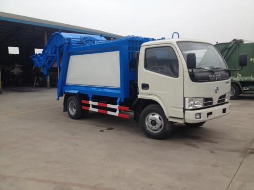 China Mini swing arm garbage truck skip loader truck arm roll container refuse truck 3-4cbm supplier