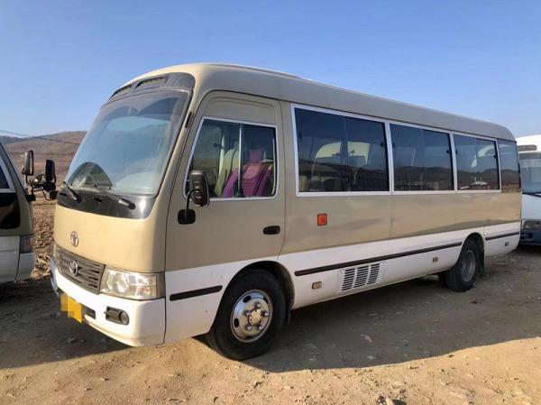 China 26 Seats Used TOYOTA Coaster Mini Bus Passenger Tourism Bus With Electric Door supplier