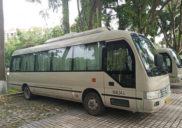 China 34 Seats Used Coaster Bus Used Mini Bus XML6809 With Electric Engine Left Hand Steering supplier
