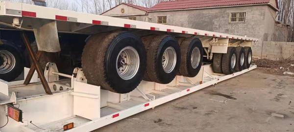 China 3 Axles 45tons Used Truck Trailer Flatbed Trailer 13M Container Carrier Used Truck Flatbed Trailer supplier