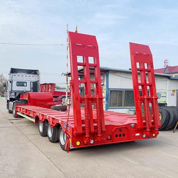 China Heavy Duty 3 Axles Lowboy Trailer 60 80 100 Tons Lowbed Low Bed Truck Semi Trailer supplier