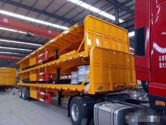 China heavy duty Flatbed semi-trailer 13m low-bed semi-trailer tri-axle flatbed semi-trailer supplier