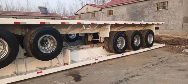 China Semitrailer Second Hand Semi Trailers 13-15Tons Low-Flat Semi-Trailer 3/4/5/6 Axle supplier